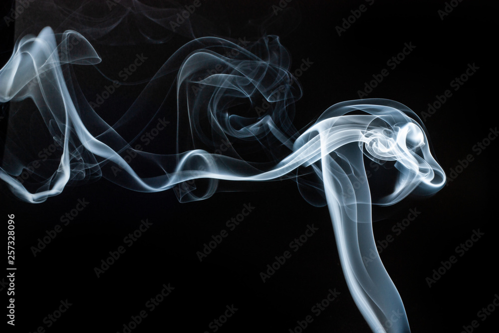 Smoke swirls on black background Smoke swirls on black background