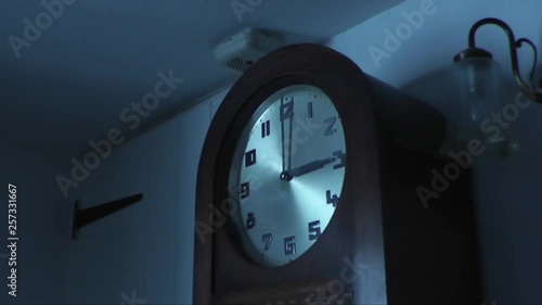 A wall clock showing 3am in an old cottage in Kent.