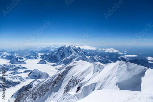 Snowy Mountain Range with blue skies