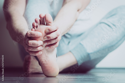 man with pain in foot © stockfotocz