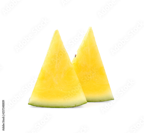 Yellow watermelon sliced on white background.