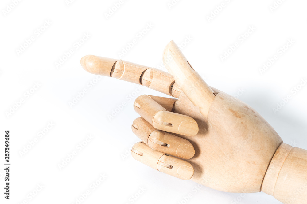 Wooden hand on a white background. With copyspace. Wooden hand on a white background. With copyspace.