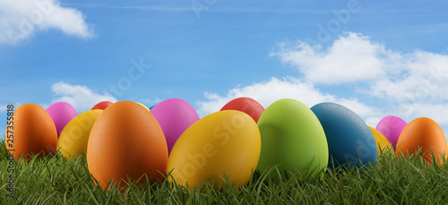 colorful Easter eggs green grass sky clouds horizon 3d-illustration