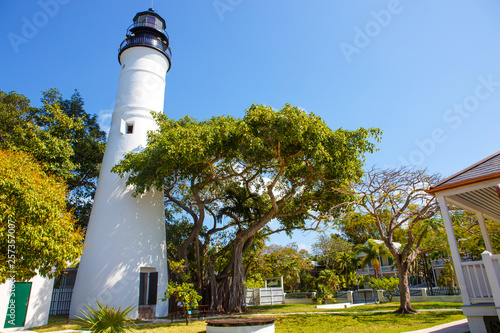The historic and popular center, lighthouse and Duval Street in downtown Key West. Beautiful small town in Florida, United States of America