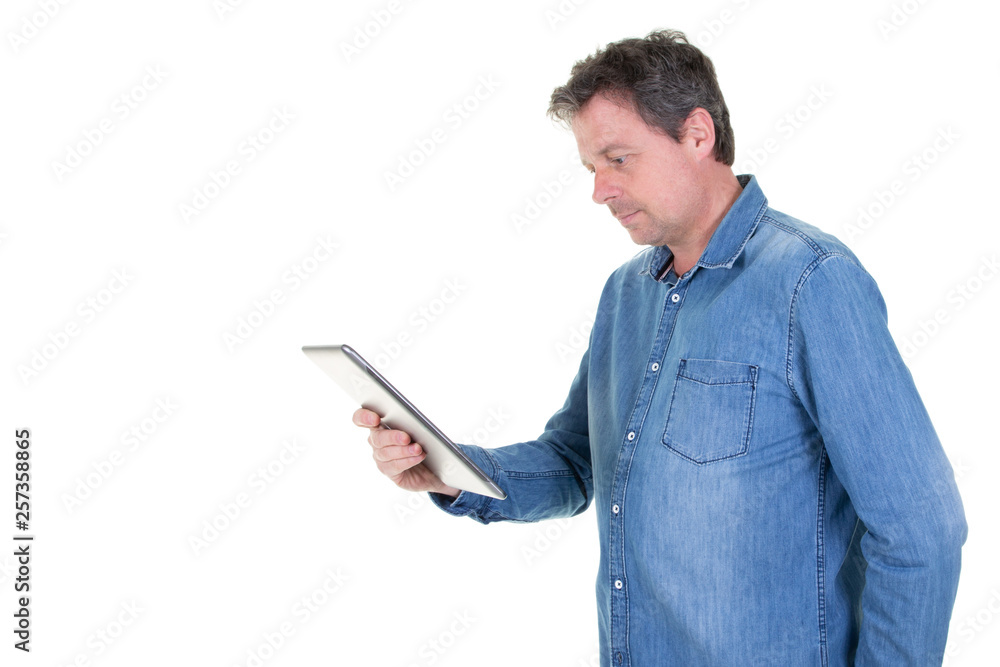 caucasian handsome businessman using tablet computer in white background and copy space caucasian handsome businessman using tablet computer in white background and copy space