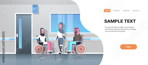 disabled arabic people injured in various cases arab patients sitting in wheelchair woman with prosthetic leg disability concept hospital corridor interior full length copy space