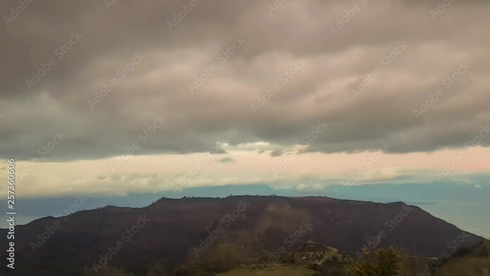 Ready to rain at Kalavrita mountain in Greece. Dramatic cloud movement. Ready to rain at Kalavrita mountain in Greece. Dramatic cloud movement.
