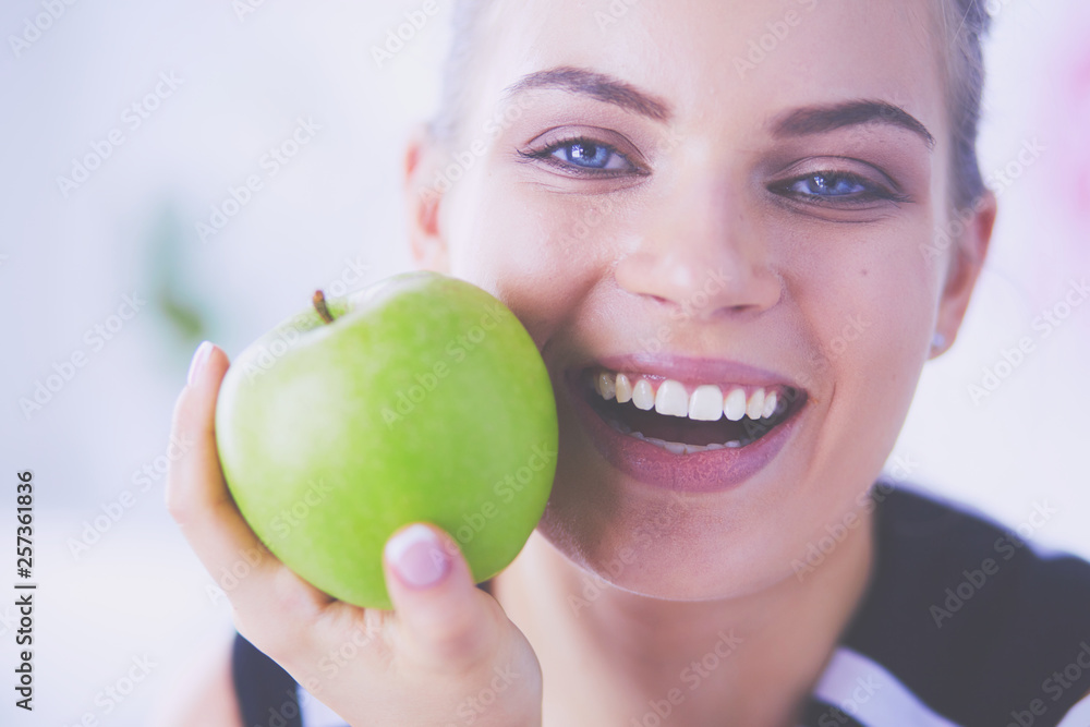 Close up portrait of healthy smiling woman with green apple. Close up portrait of healthy smiling woman with green apple.
