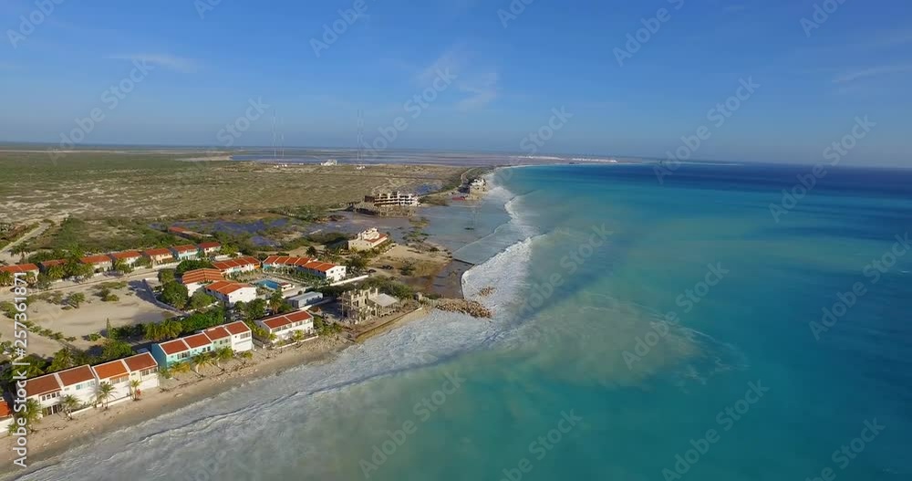 Big waves damaging houses after a hurricane passed by at the coastline of Bonaire. Big waves damaging houses after a hurricane passed by at the coastline of Bonaire.