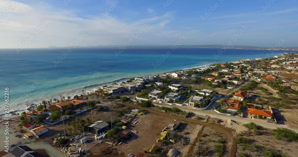 Big waves damaging houses after a hurricane passed by at the coastline of Bonaire. Big waves damaging houses after a hurricane passed by at the coastline of Bonaire.