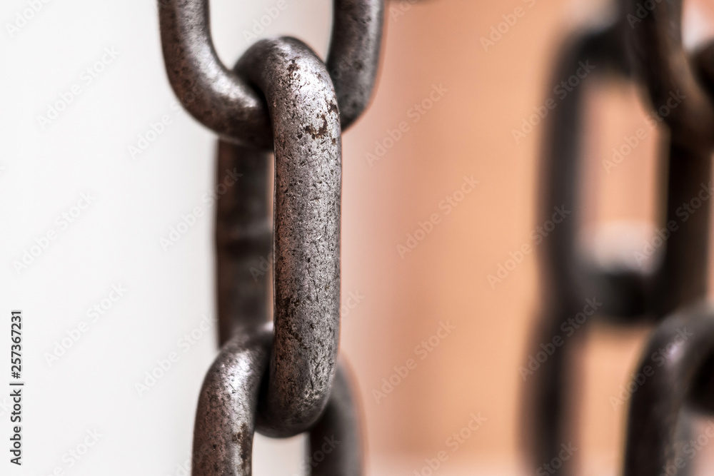 rusty metal chain on background