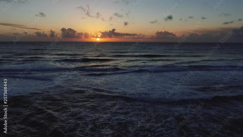 Blazing colors of sunset beach, rhythmically beaten by Pacific Ocean Waves. Natural golden saturation. Drone based aerial footage. Cinematic and beautiful. calming and Relaxed Euphoric camping Blazing colors of sunset beach, rhythmically beaten by Pacific Ocean Waves. Natural golden saturation. Drone based aerial footage. Cinematic and beautiful. calming and Relaxed Euphoric camping