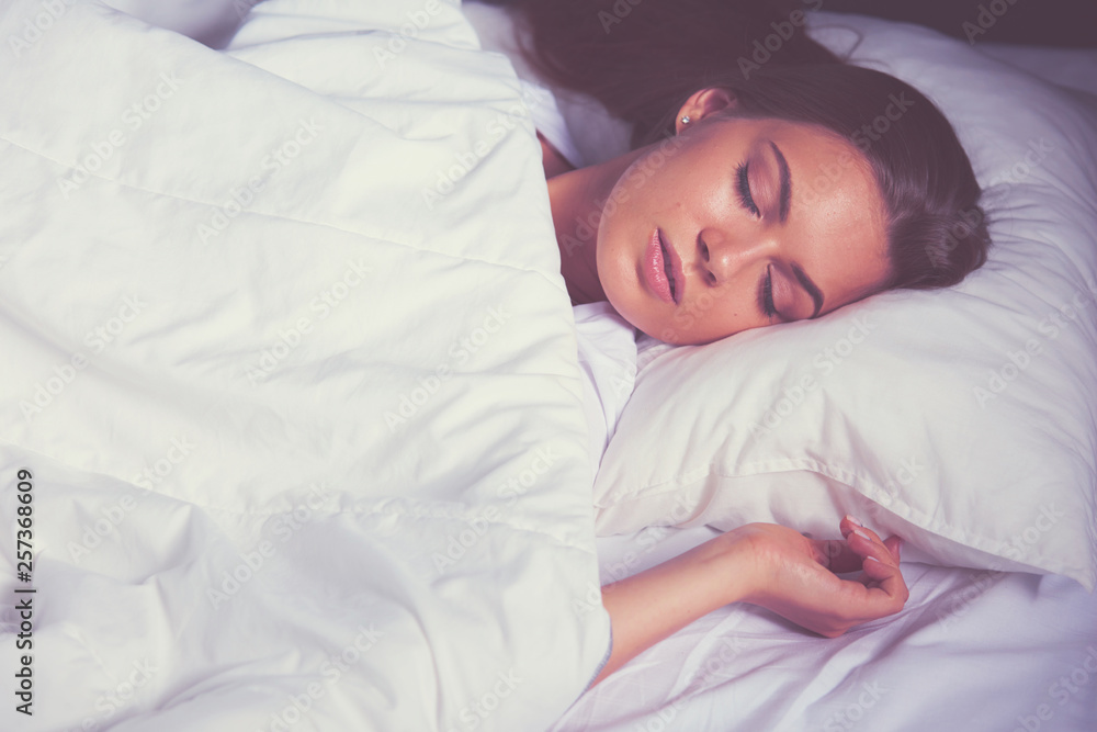 Beautiful young blonde woman sleeping in bed Beautiful young blonde woman sleeping in bed