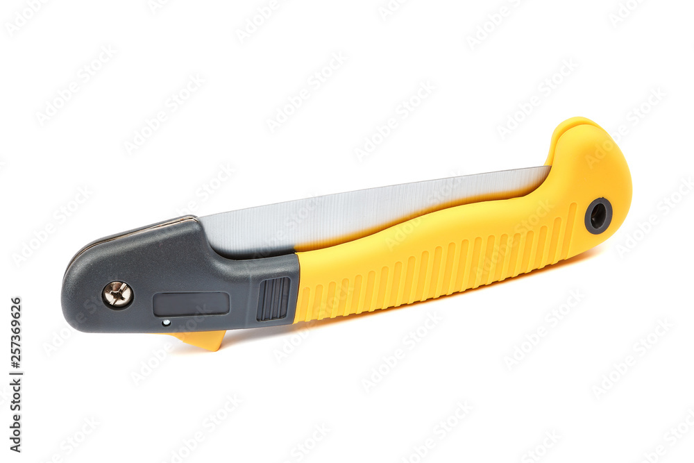 Folding saw isolated on a white background. Folding saw isolated on a white background.