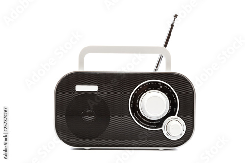 Stylish compact radio receiver isolated on white background photo