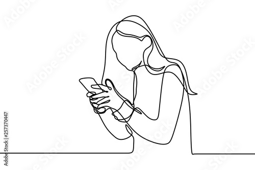 Continuous one line drawing of girl playing and using mobile phone or smartphone