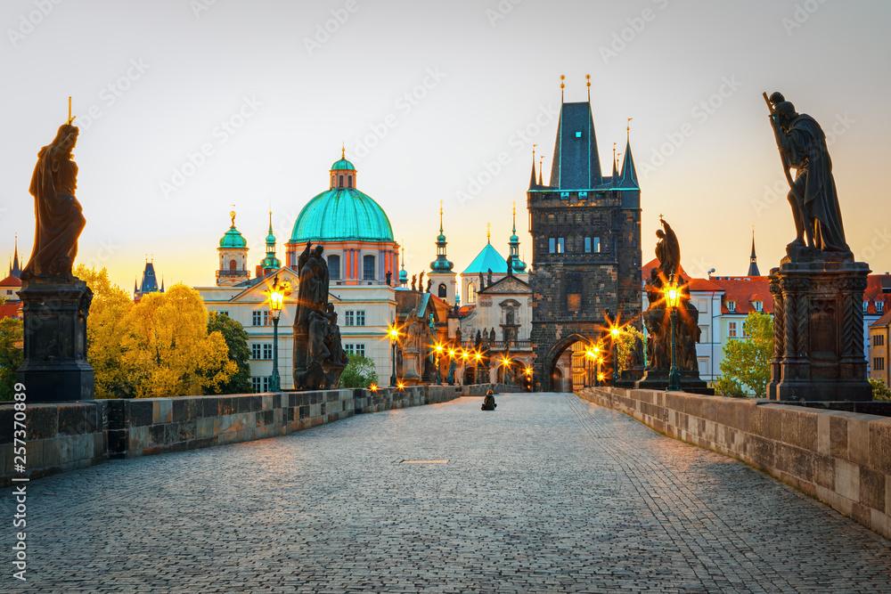 Scenic view on Vltava rive, Charles bridge and historical center of Prague, buildings and landmarks of old town at sunset, Prague, Czech Republic