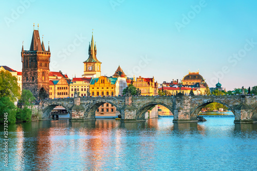 Scenic view on Vltava rive  Charles bridge and historical center of Prague  buildings and landmarks of old town at sunset  Prague  Czech Republic