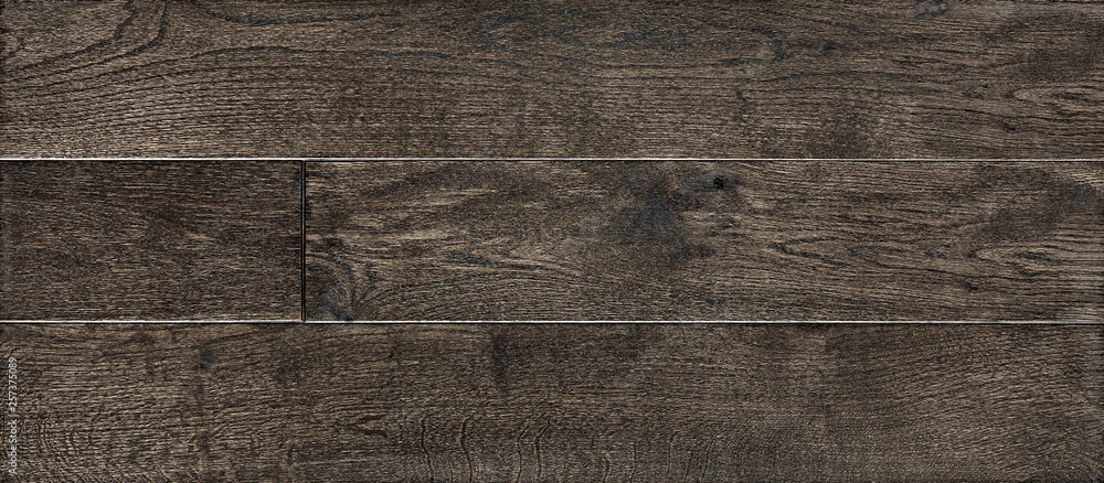 Obraz premium parquet from solid wood. sample of parquet. texture or background. wood texture. board. painted with natural oil. wax. mastic. imitation of valuable species of wood.