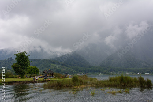 Buddhist temple on the lake in the mountains. Pura Ulun Danu Bratan. Bali Indonesia © Maks_Ershov