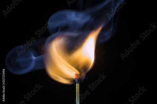 Matches and fire On a black background