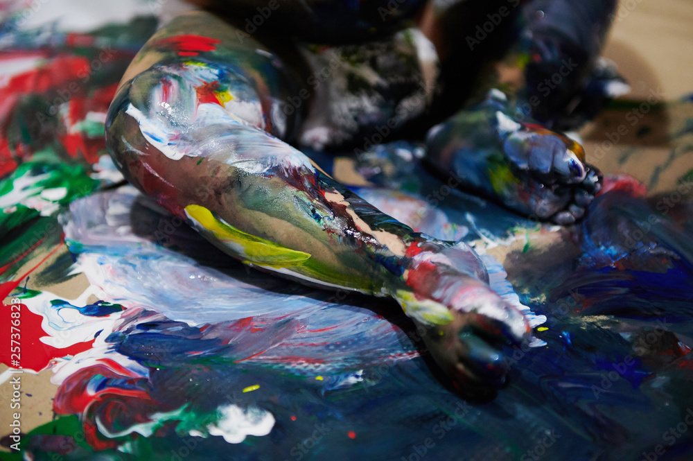 Fototapeta premium Baby playing with paint theme