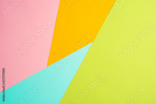 texture background of fashionable pastel color with top view, minimal concept, flat lay: blue, orange, green and pink