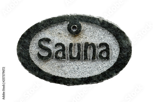 stone tablet  with the inscription sauna  on a white photo