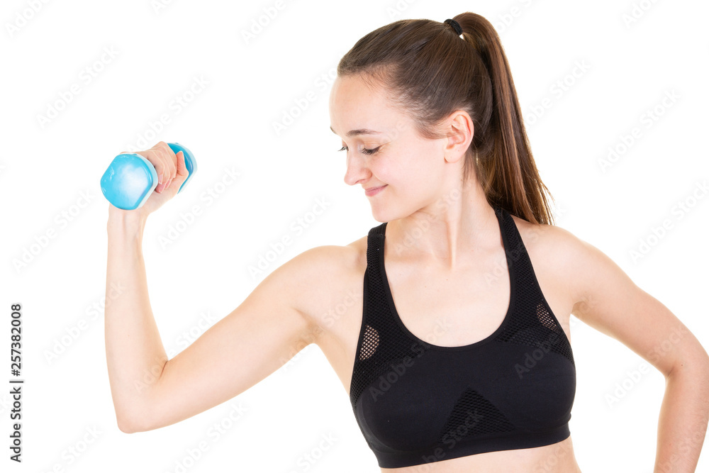 Woman with dumbbell fit slim pretty body isolated over white background Woman with dumbbell fit slim pretty body isolated over white background
