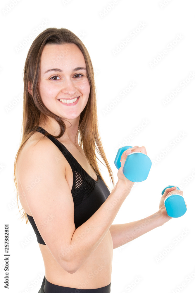Beautiful young woman exercise with blue dumbbells on white background Beautiful young woman exercise with blue dumbbells on white background