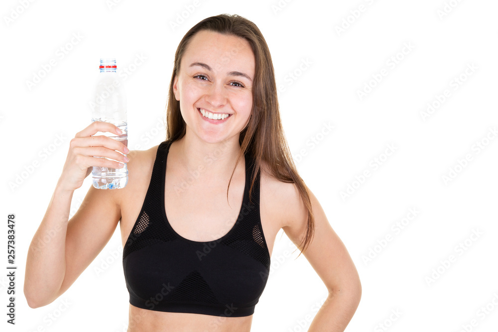 Smiling young fitness woman bottle of water on white background Smiling young fitness woman bottle of water on white background