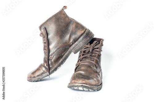 Old leather boots On a white background