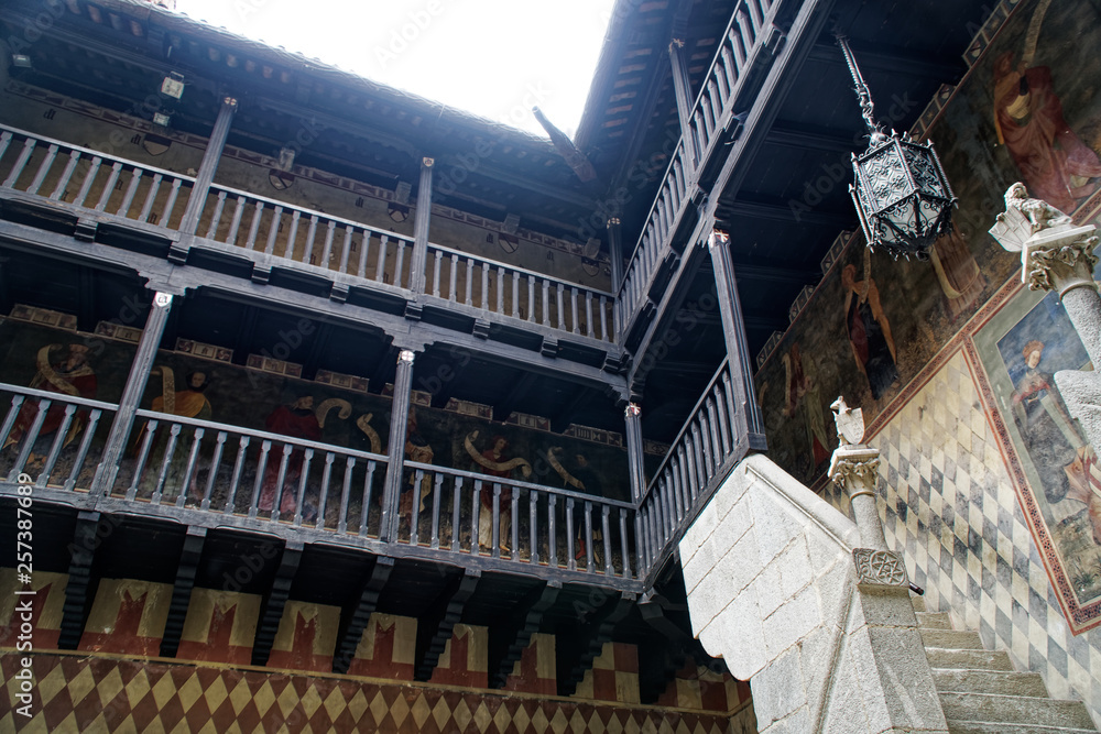 Obraz premium Medieval wooden gallery of the second floor in an old stone castle