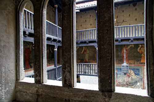 Medieval wooden gallery of the second floor in an old stone castle