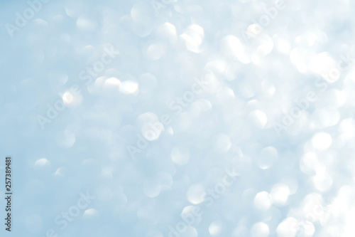 Abstract natural bokeh background in white and blue colors