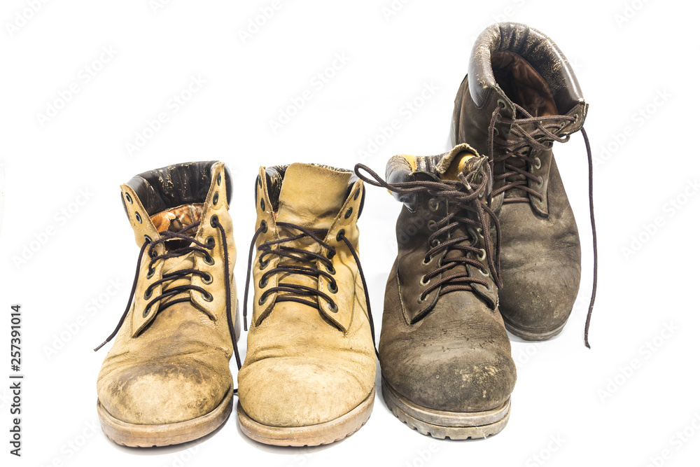 Old leather boots On a white background Old leather boots On a white background