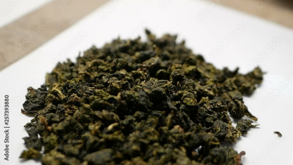 Green tea on white background. Close up. Green tea on white background. Close up.