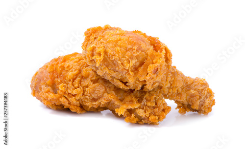 hot and crispy fried chicken legs isolated on a white background