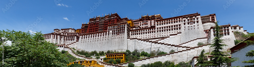 LHASA, TIBET / CHINA - July 31, 2017: Magnificent panorama of Potala Palace. Unesco World Heritage, home of the Dalai Lama, one of the most important pilgrim sites of the Tibetan Buddishm. Spirit.