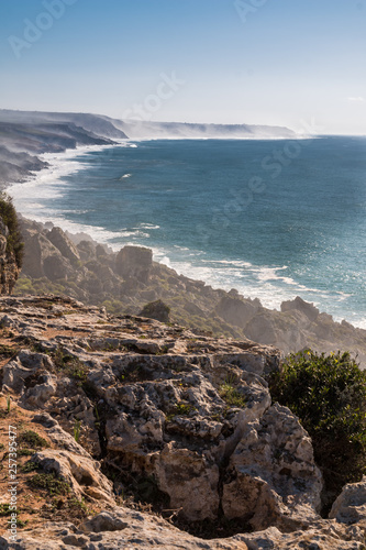 Coast in a mist and Atlantic ocean, Morocco photo