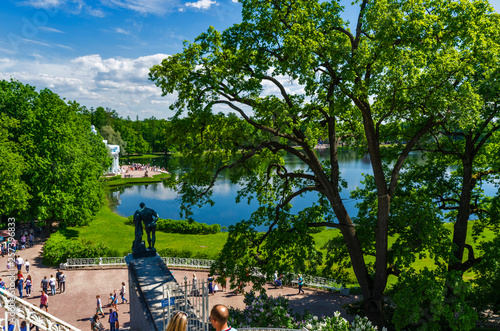 Summer Landscape Park in Russia. Courtyard garden of the Catherine Palace with green lawns and flower beds, St. Petersburg photo