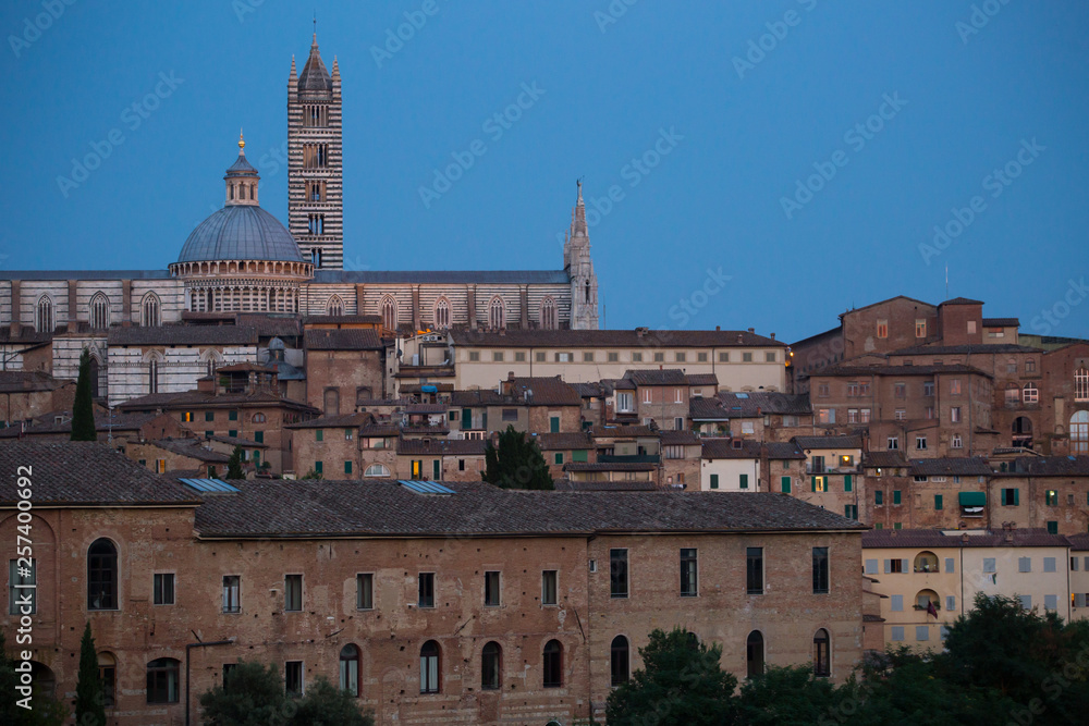 View to Siena by night, Italy