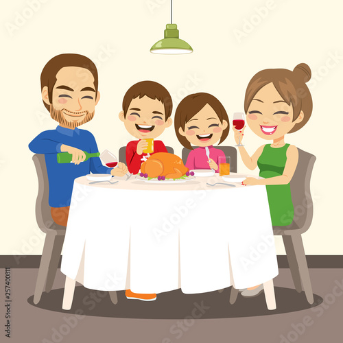 Happy family having dinner enjoying delicious roasted chicken sitting together on table