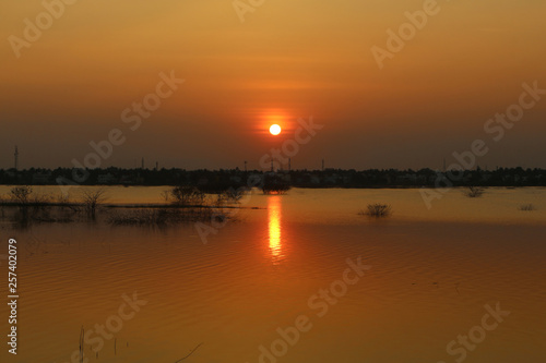 River bank sun set. © align