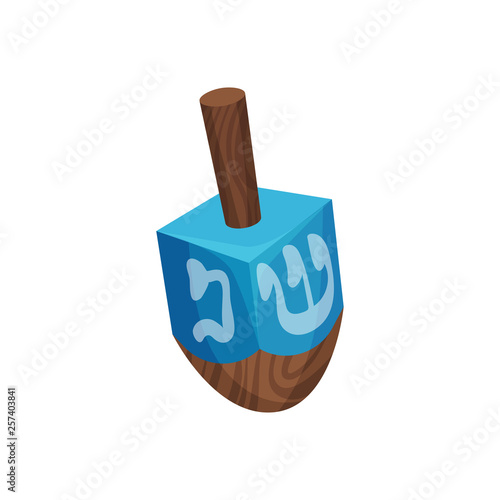Hanukkah dreidel on white background. Jewish culture.