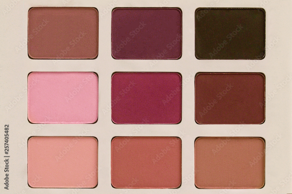 Multicolored cosmetic shadow palette close-up, single object without background Multicolored cosmetic shadow palette close-up, single object without background
