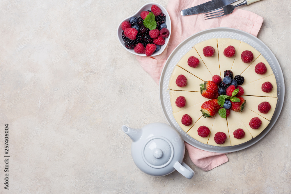 Top view holiday cake with berries on light background Top view holiday cake with berries on light background
