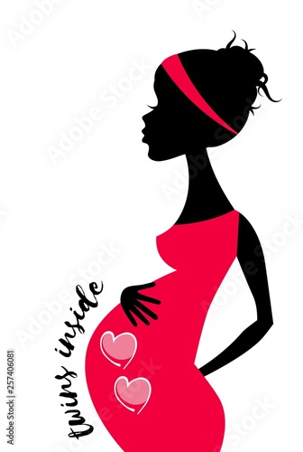 Silhouette of enceinte woman with two hearts in multiple pregnancy