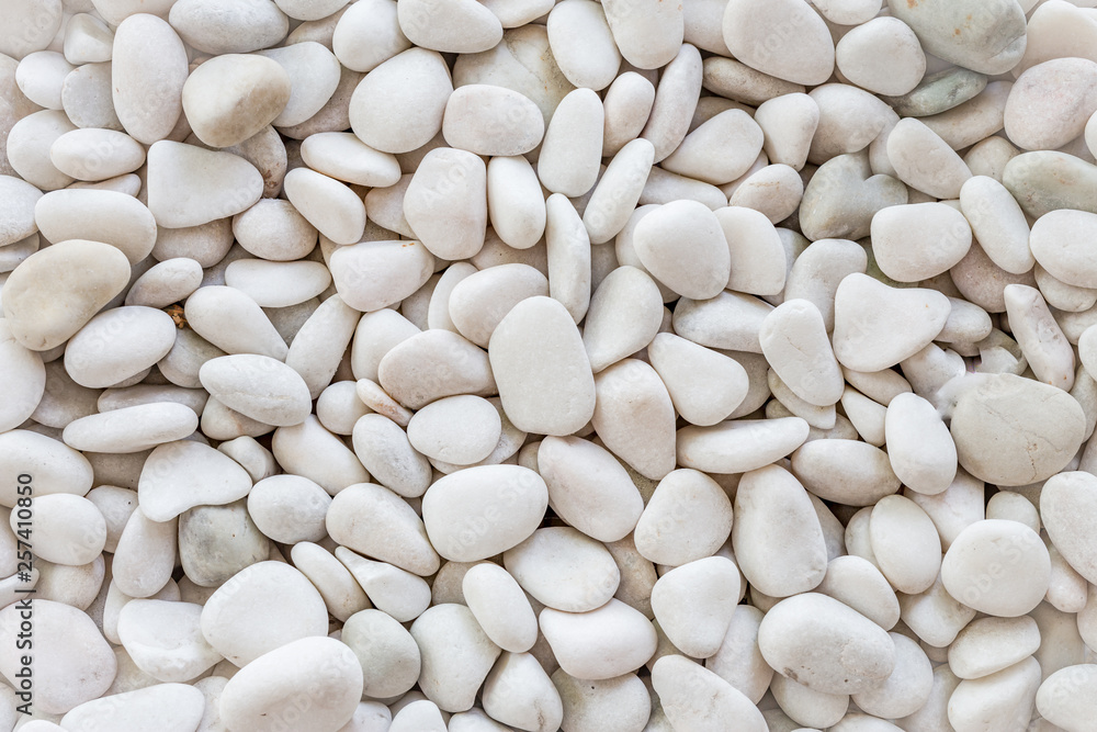 White pebbles stone texture and background. 
