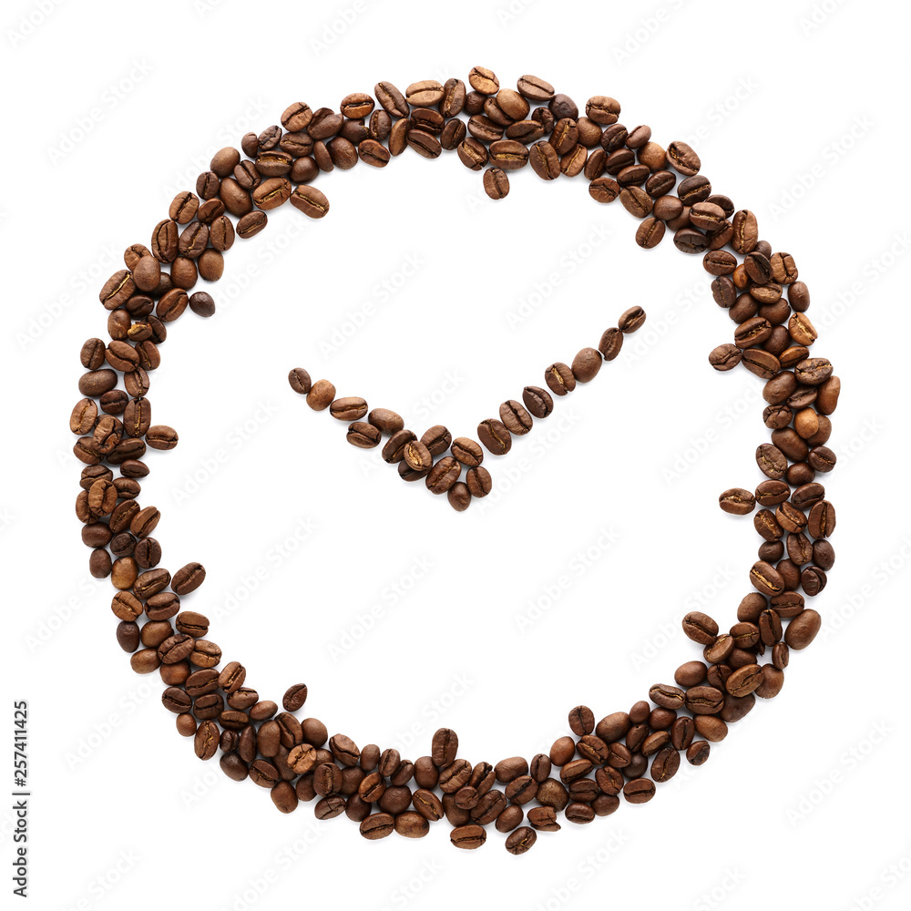 Clock made of roasted coffee beans. Coffee time concept. Clock made of roasted coffee beans. Coffee time concept.